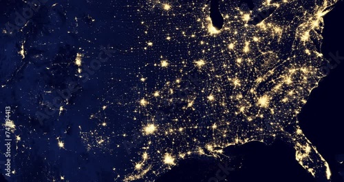 The bright lights of many USA cities at night, as seen from an orbiting satellite. Night map of the southern states or Dixieland with densely populated areas. Elements of this image courtesy of NASA. photo