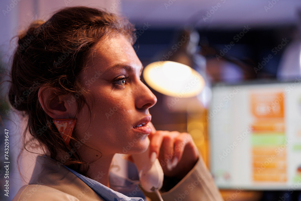 Businesswoman analyzing financial growth report in startup office, talking at landline phone with remote coworker. Executive manager planning financial investment strategy to increase business profit Businesswoman analyzing financial growth report in startup office, talking at landline phone with remote coworker. Executive manager planning financial investment strategy to increase business profit