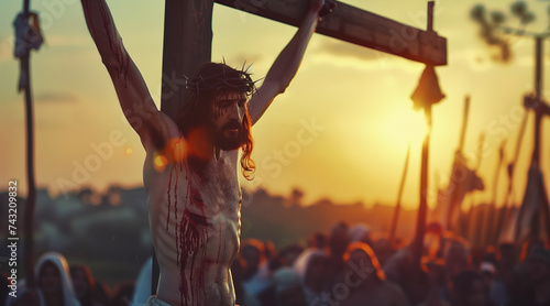 Crucifixion of Jesus Christ on the cross at Calvary against a sunset. Good friday, holy week, easter concept photo