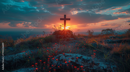 Cross at sunset on top of a hill