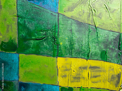 Geometric painting yellow, blue, green colors. Acrylic colors on canvas painting. Artwork fragment. Art painting texture. Colorful background. photo