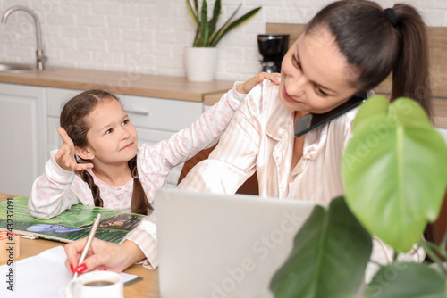 Working mother with her ups...