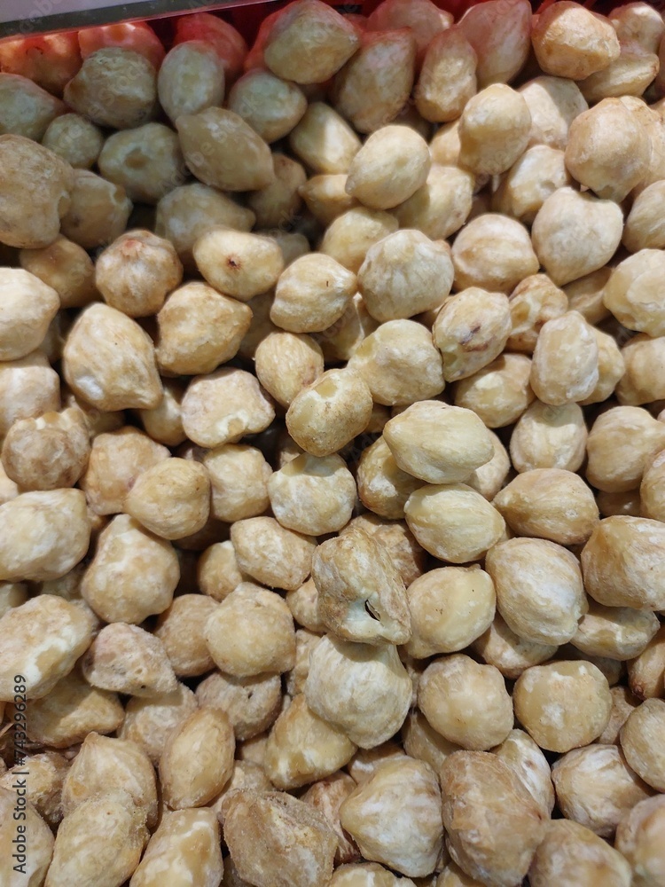 Candlenut or Kukui is a spice especially used in indonesian cooking. one of herbs that usually used for asian food as seasoning. Candlenut or Kukui is a spice especially used in indonesian cooking. one of herbs that usually used for asian food as seasoning.