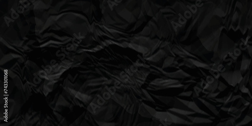 Black crumpled paper texture. black wrinkled paper texture. black paper texture. black crumpled and top view textures can be used for background of text or any contents.
