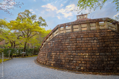 Kyoto, Japan - April 6 2023: Adashino Nenbutsuji Temple founded in 811 situated on up hill and slightly distanced from the major tourist area of Arashiyama photo