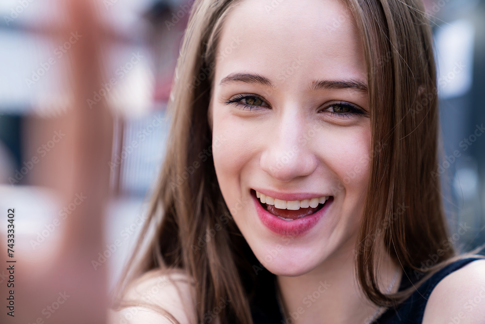 Portrait of young beautiful caucasian female use smartphone selfie say hi over white background. Happy woman online influencer blogger. Education technology connected people girl lifestyle concept Portrait of young beautiful caucasian female use smartphone selfie say hi over white background. Happy woman online influencer blogger. Education technology connected people girl lifestyle concept