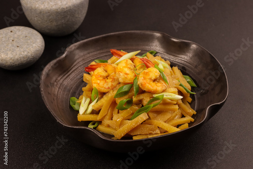 Adobong Labong or Bamboo Shoots Adobo is Filipino Stew made with Bamboo Shoots Slices, Soy Sauce and Shrimp. photo