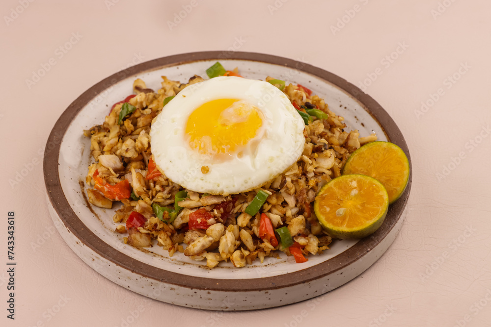 Bangus Sisig is Filipino Traditional Food Made with Flaked Milk Fish, Citrus Juice and Peppers. Bangus Sisig is Filipino Traditional Food Made with Flaked Milk Fish, Citrus Juice and Peppers.