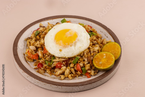 Bangus Sisig is Filipino Traditional Food Made with Flaked Milk Fish, Citrus Juice and Peppers. 
