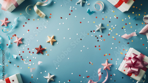 Happy birthday setup concept. Top view composition featuring table with vibrant disposable tableware, utensils, wrapped gifts, birthday hats, and more on light blue background with space for text photo