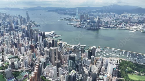 Hong Kong Convention and Exhibition Centre in Wan Chai Central Admiralty Causeway Bay CBD facing Victoria Harbour Kowloon Tsim Sha Tsui ,4K drone shot of property commercial area photo