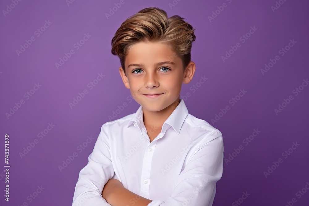 Portrait of a cute little boy in a white shirt on a purple background. Portrait of a cute little boy in a white shirt on a purple background.