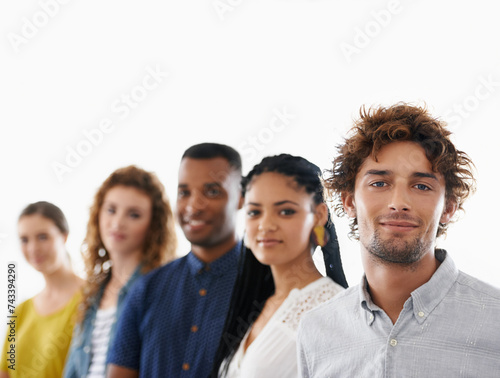 Happy, pride and team of business people in studio with collaboration, unity or diversity. Confident, smile and portrait of group of creative designers isolated by white background with mockup space.