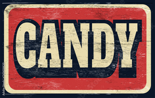 Vintage distressed candy sign on wood