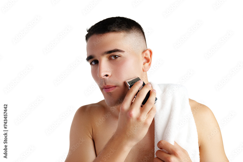 Handsome young man shaving face with electric razor on white background Handsome young man shaving face with electric razor on white background
