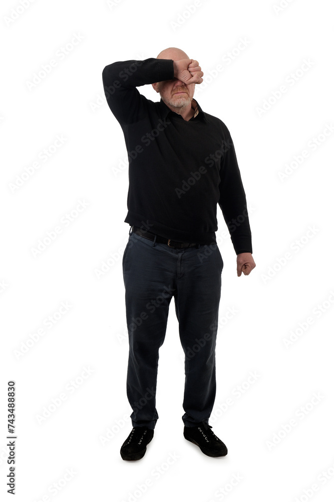 front view of a man covering her face with her arm on white background front view of a man covering her face with her arm on white background