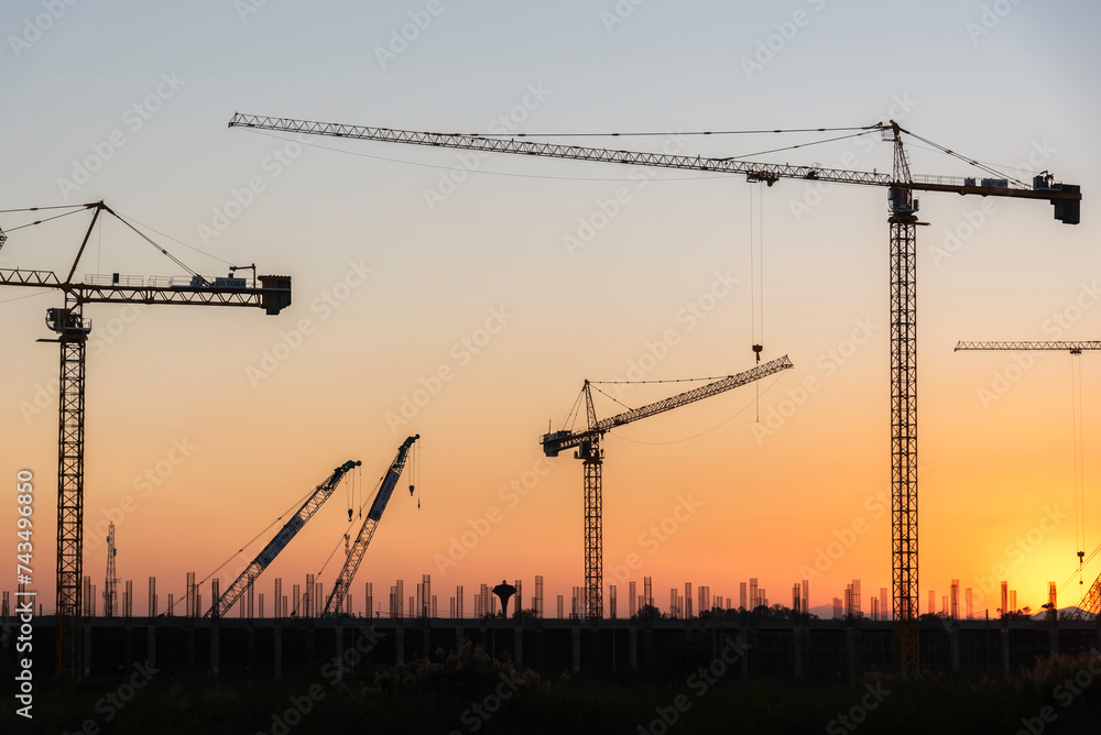 Heavy lifting cranes for use in construction projects.