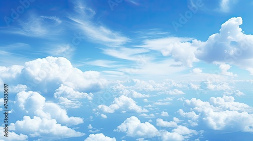 Blissful Blue Cloudy Sky. A Dreamy Sky with Cotton-Like Clouds in the Atmosphere