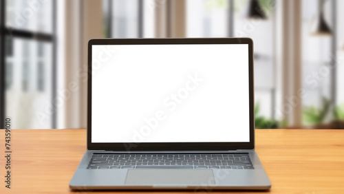 Laptop computer on desk at office or co-working space, Laptop with white blank on screen and blurred background , working space concept.