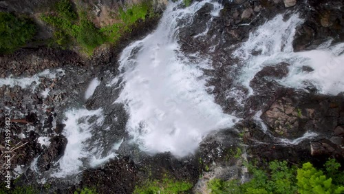 Majestic Waterfall Top View of Water Cascading Over Cliffs