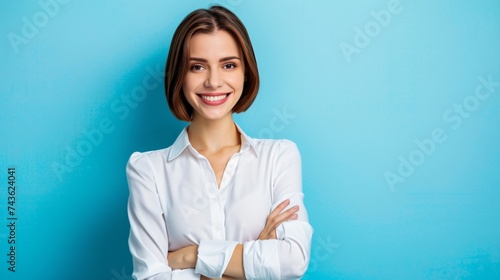 stock Photo of young beautiful lady in white office shirt with cute bob hairstyle