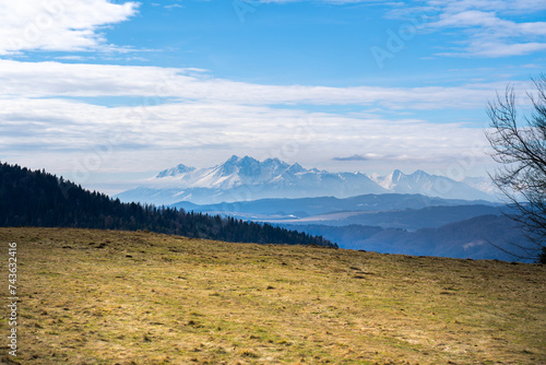 Fototapeta Naklejka Na Ścianę i Meble -  Panorama High Tatra Mountains in early spring, view from Wierchomla, Beskid Sadecki, Poland.