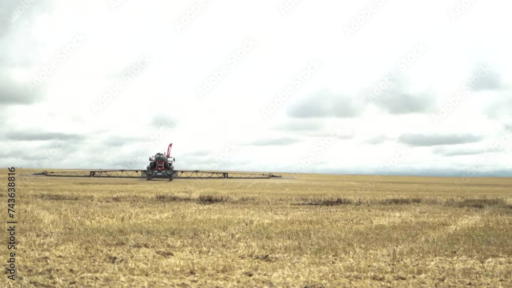 Sprayer Fertilizes the Field With Chemicals Sprayer Fertilizes the Field With Chemicals