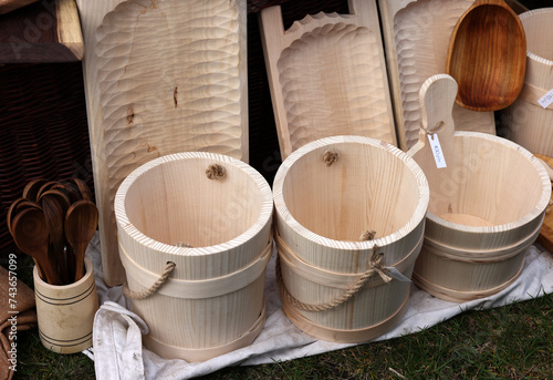  Imitations of old wooden vessels in knight camp at the festival of historical reconstruction photo