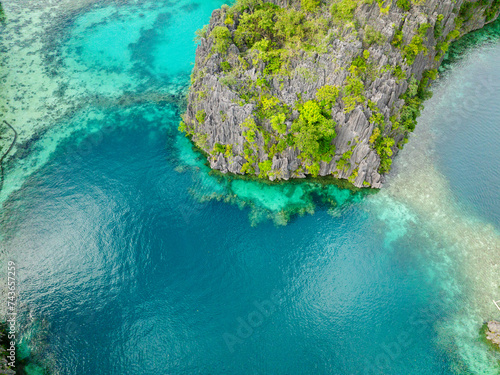 Beautiful splendid limestone rock formation and clear turquoise lagoon in Coron, Palawan. Philippines.