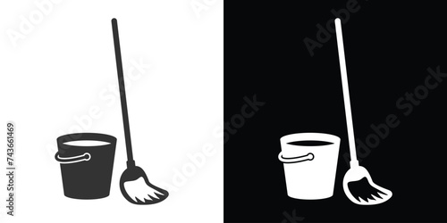 bucket and mop on black an white