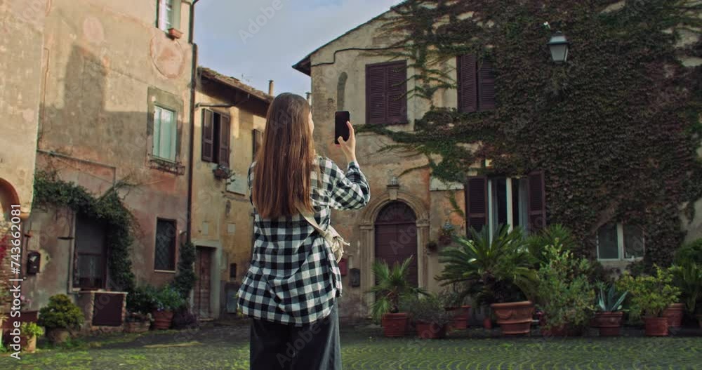 Lifestyle photo in memory of a tourist in Italy. Walks through the old streets of the city, moments in the photo of happy women. High quality 4k footage Lifestyle photo in memory of a tourist in Italy. Walks through the old streets of the city, moments in the photo of happy women. High quality 4k footage