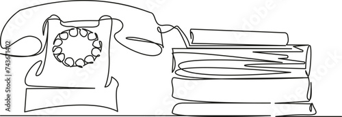 landline phone with books