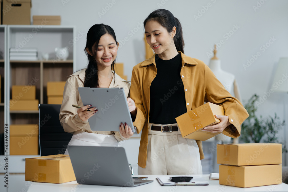 Businessman using laptop computer in office. Happy woman, entrepreneur, small business owner working online. Businessman using laptop computer in office. Happy woman, entrepreneur, small business owner working online.