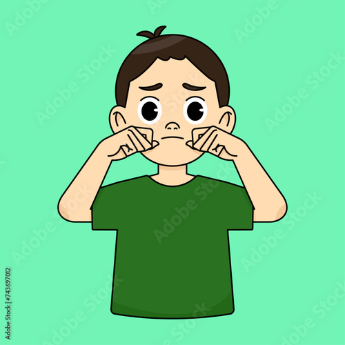 The boy wipes his tears, cries and is sad, sulks and gets upset