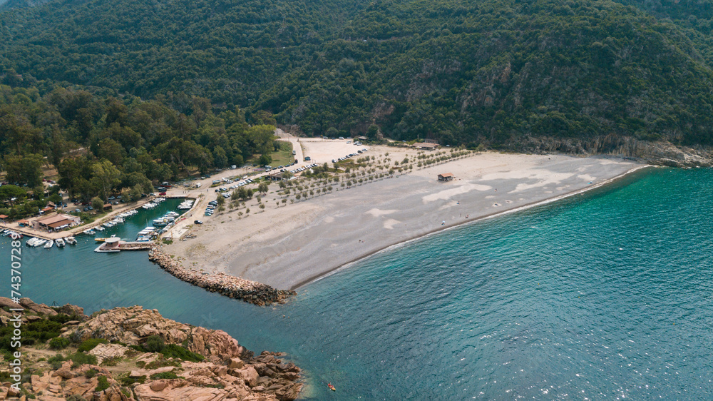 Obraz premium Drone photography of Calanches Piana and Porto ota city with rock cliffs and turquoise waters in Cap Corse