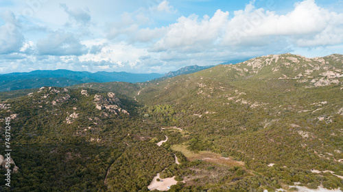 Aerial photo by drone of the roccapina beach in Sartène, the turquoise sea and the sleeping lion rock in Corsica photo