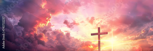 Cross of Jesus Christ on sunset sky background. Christian religion concept. © Prasanth
