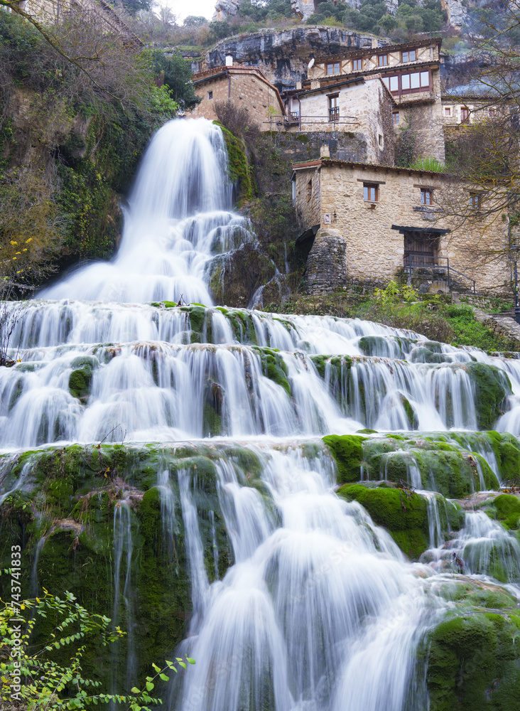 Obraz premium Orbaneja del Castillo. The waterfall of Orbaneja del Castillo in the province of Burgos.