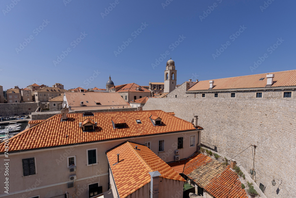 City Walls with Clock tower, surrounding medieval city on the Adriatic Sea, Dubrovnik, Croatia