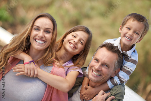 Mother, father and children or outdoor portrait together or holiday bonding in nature, travel or vacation. Parents, siblings and face or smile for summer sunshine in Florida garden for a trip