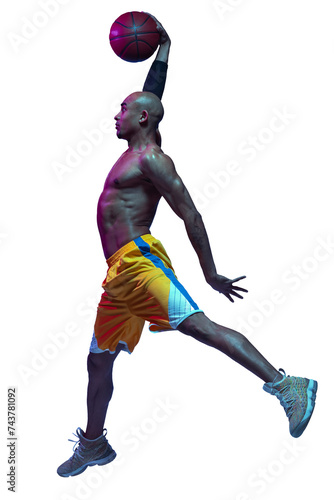 Slam dunk. Full-length image of sportive young male basketball player in motion with ball, jumping isolated on transparent background. Concept of sport, competition and tournament, health