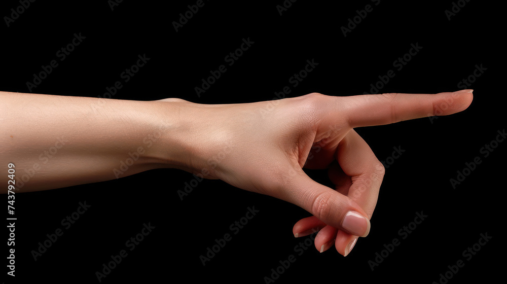 Female hand, thumb-side view, forefinger pointing away. Hand gestures - woman indicating on virtual object with index finger, isolated on black background, copy space. Female hand, thumb-side view, forefinger pointing away. Hand gestures - woman indicating on virtual object with index finger, isolated on black background, copy space.