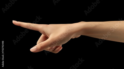 Female hand, thumb-side view, forefinger pointing away. Hand gestures - woman indicating on virtual object with index finger, isolated on black background, copy space. 