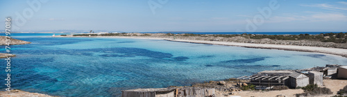 Ses Illetes beach panorama in Formentera island. Clear water paradise in the Mediterranean Sea photo