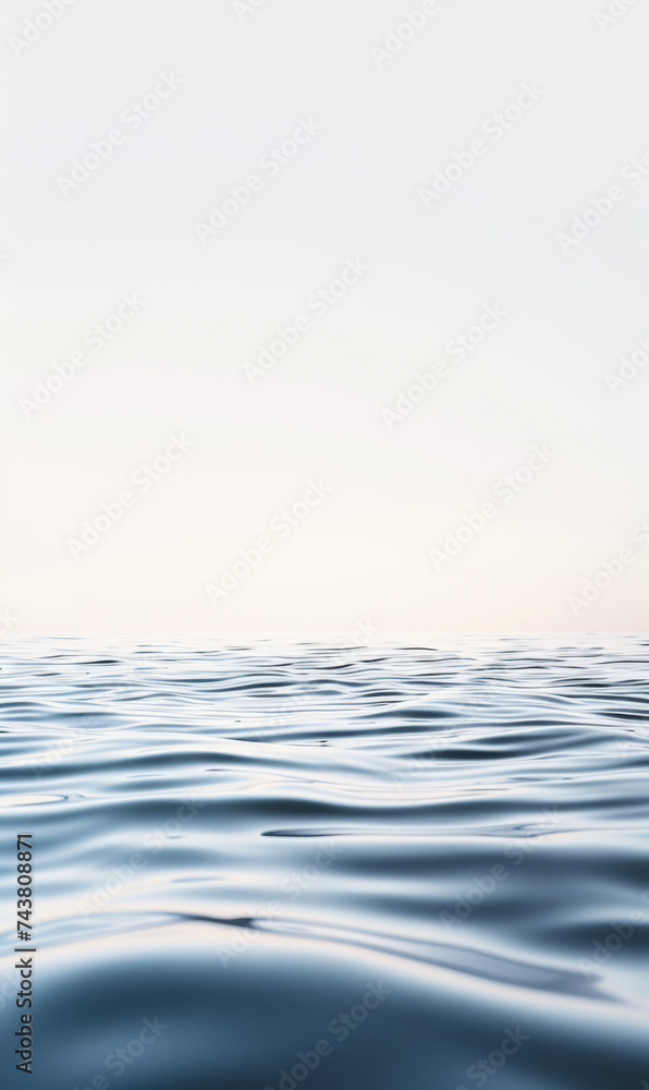 Obraz premium Calm blue water surface with a simple and clean horizon.