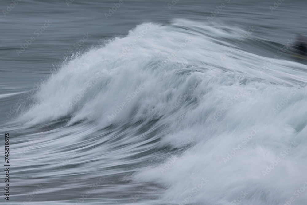 Close-up view of breaking wave in motion.