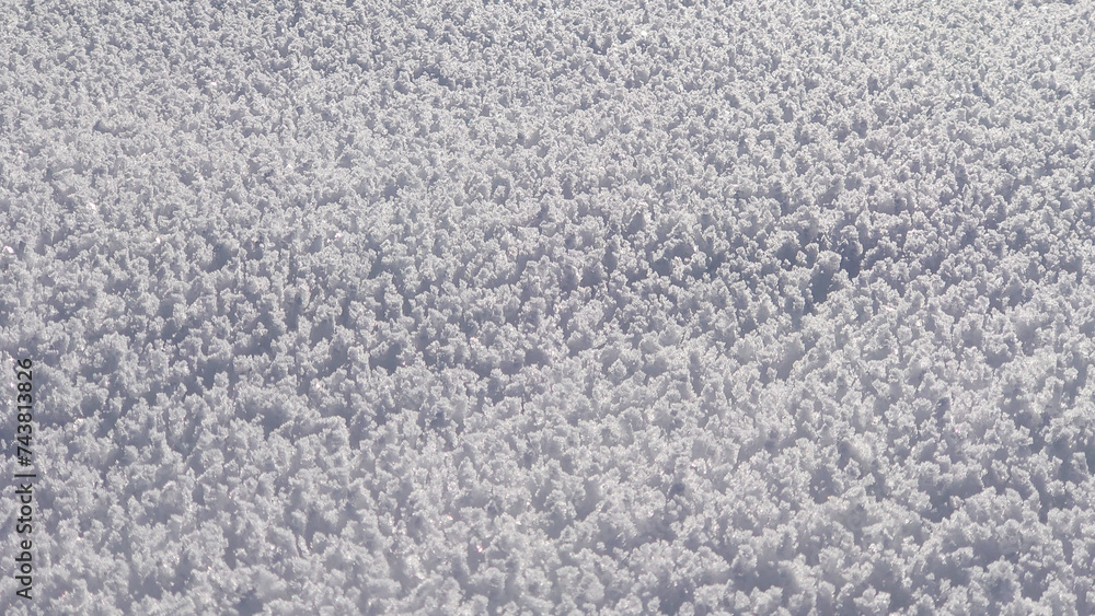 Snow textures after fresh snowfall, forming ice crystals on the ground and beautifull untouched snow cover. Snow textures after fresh snowfall, forming ice crystals on the ground and beautifull untouched snow cover.