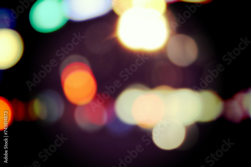 Colorful background with defocused lights. Bokeh abstract light background. Holiday abstract background. light bokeh texture glittering blur