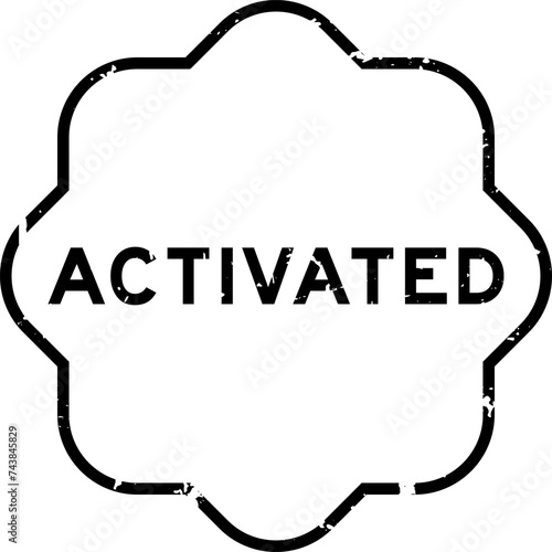 Grunge black activated word rubber seal stamp on white background