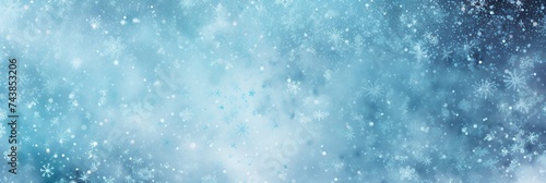 Blue and white background with delicate snowflakes gently falling, creating a serene and magical atmosphere